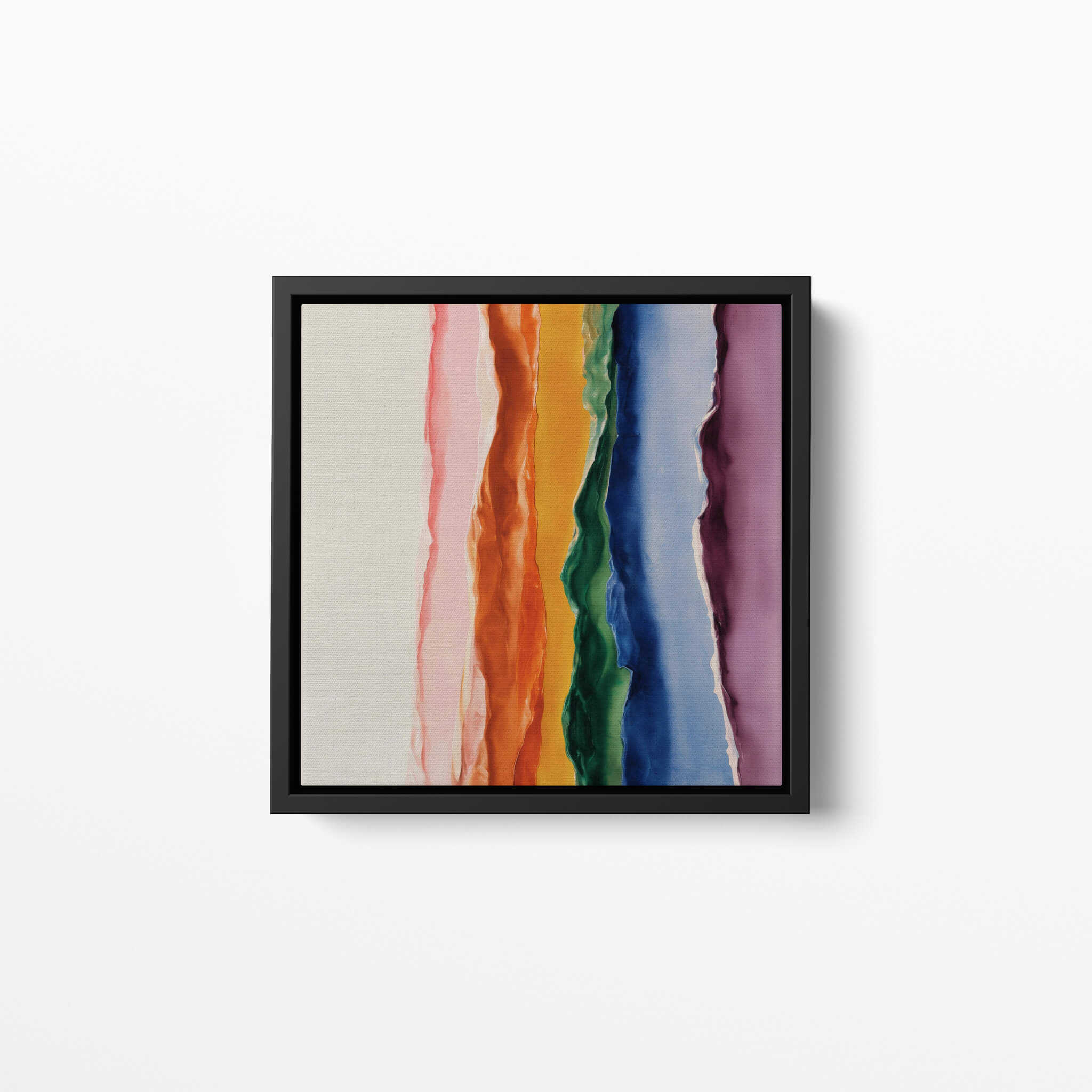Framed abstract artwork with colorful oil paint stripes on a white background