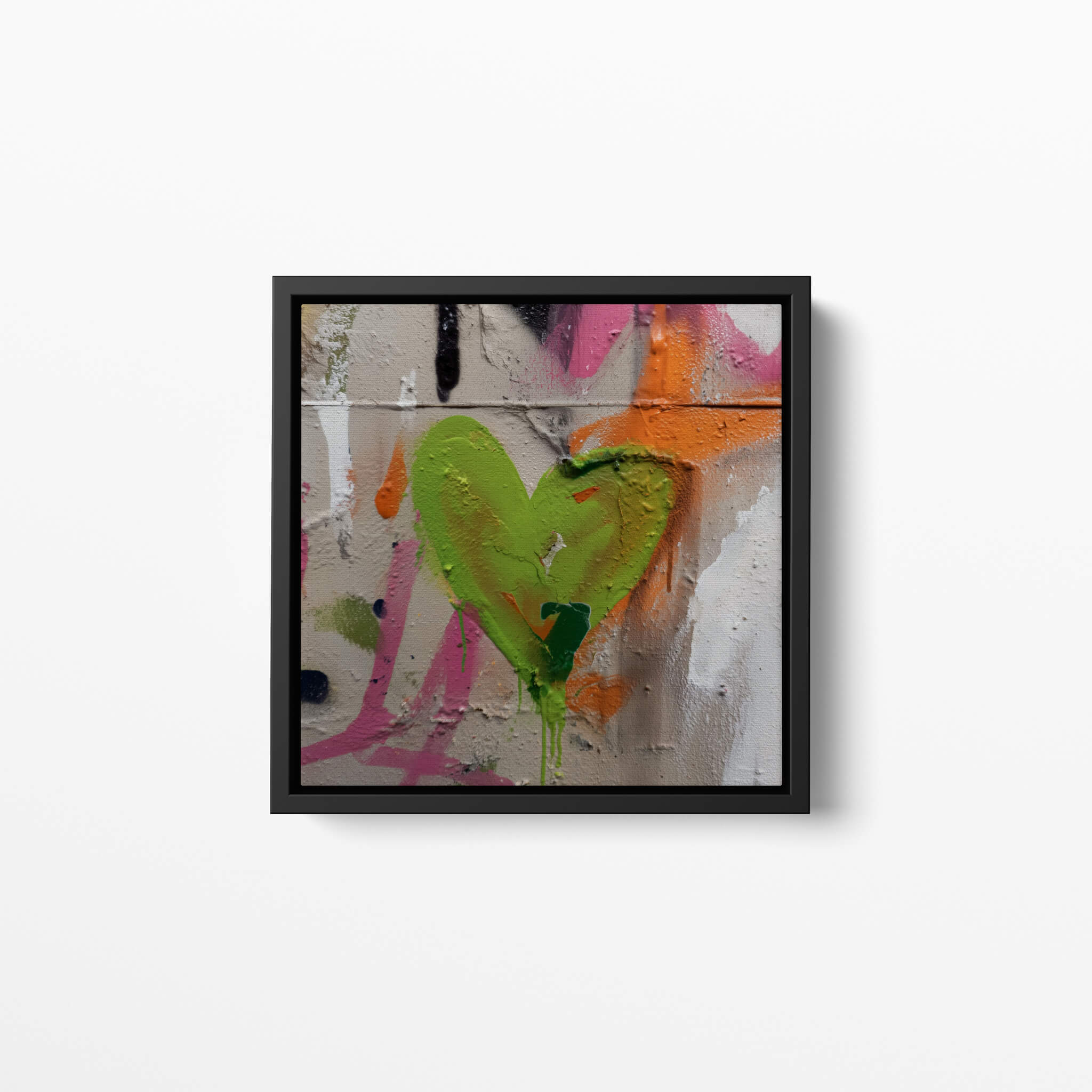 Framed abstract artwork with a green graffiti heart shape on a textured background