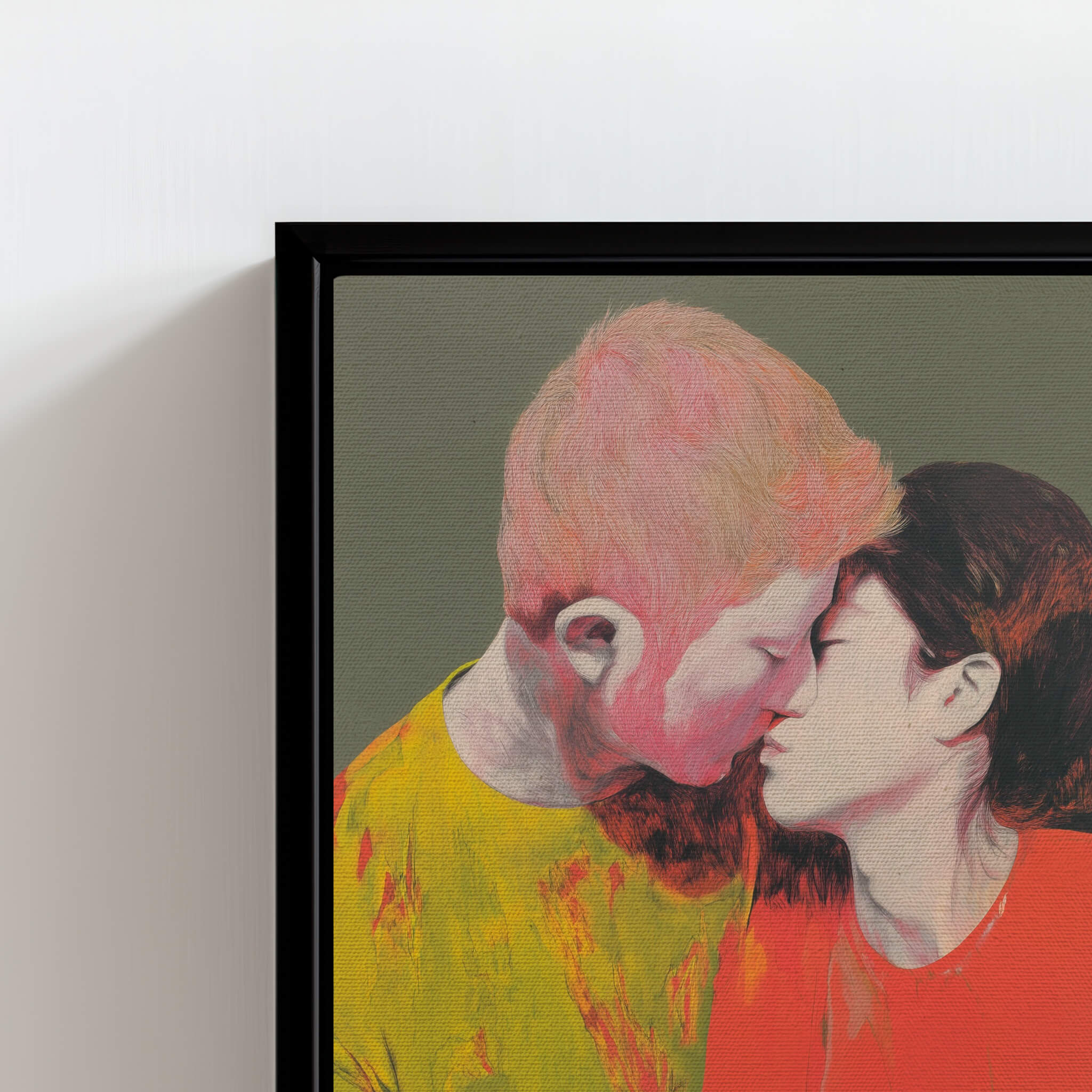 Framed artwork of a couple kissing, mixed media painting in a black frame