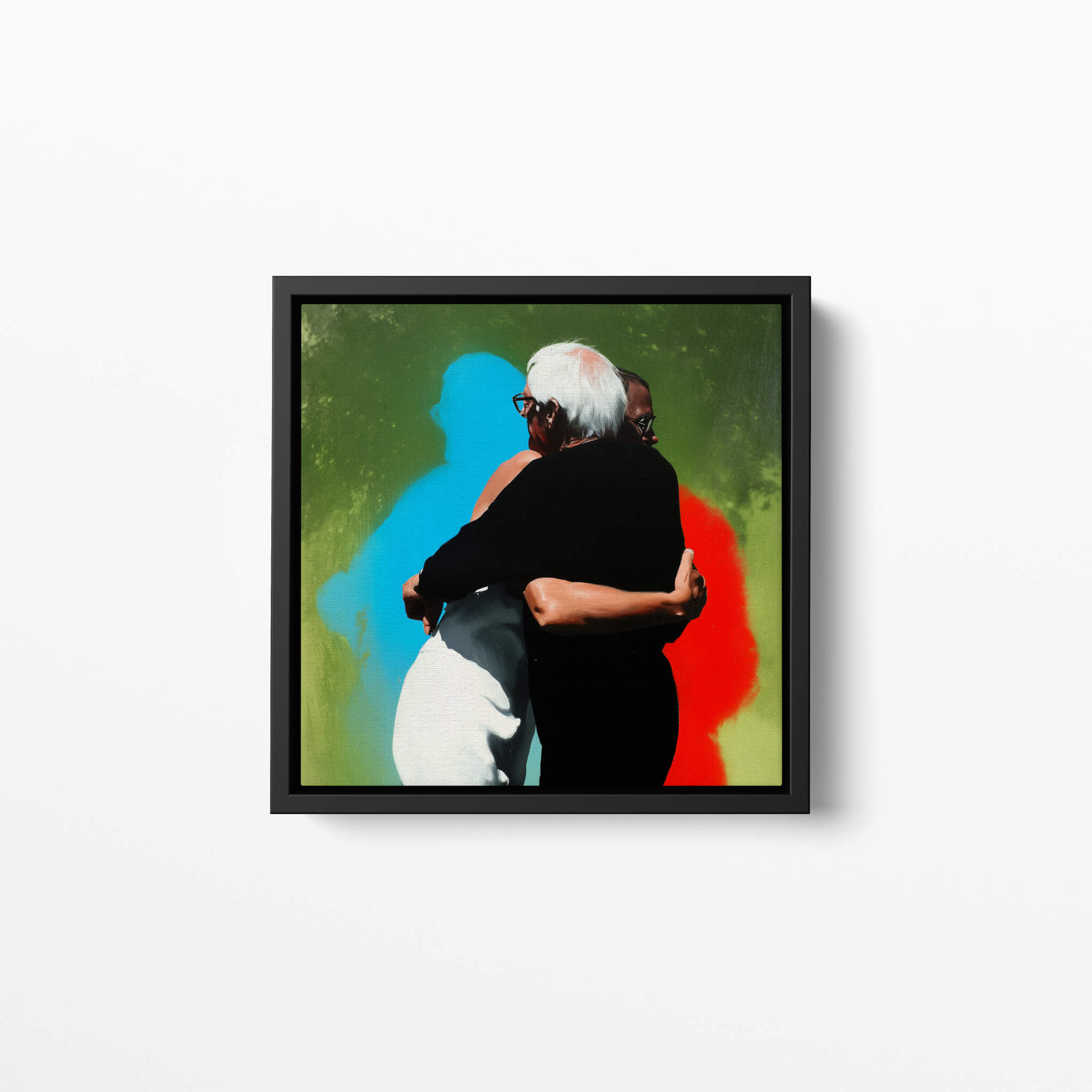 Framed artwork of two people hugging with a colorful abstract background.